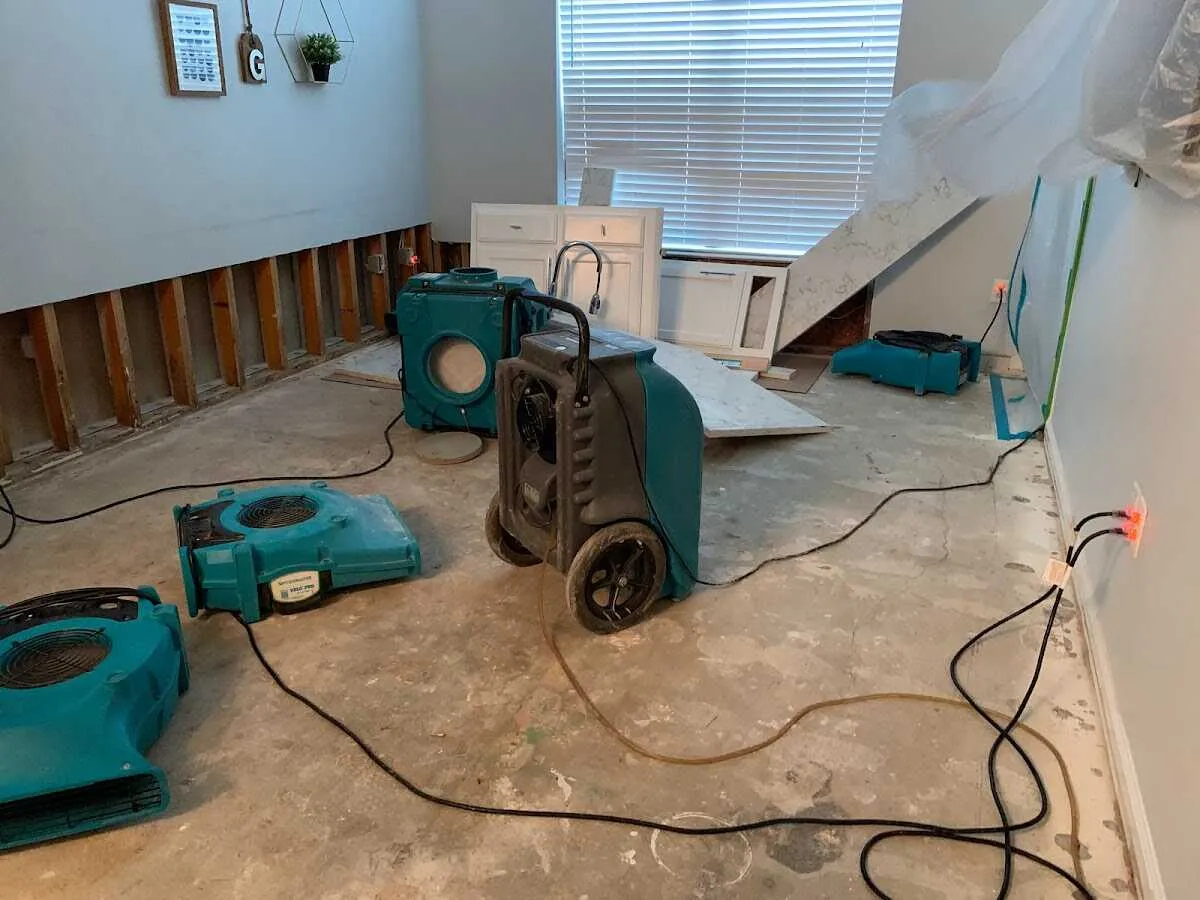 Dehumidifier in flood-cut room for Water Damage Restoration in Venersborg